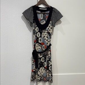 Chic Black and White Midi Dress with Flutter Sleeves